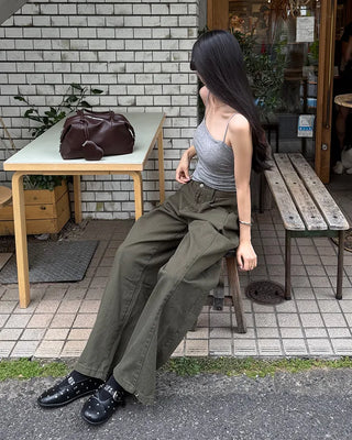 Side-tucked white cotton pants
