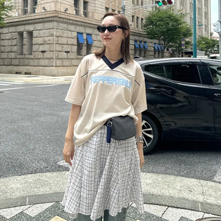 Pleated check midi skirt