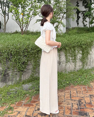 Two-button strap slacks