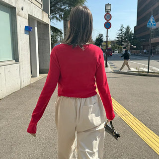 Round punching cardigan
