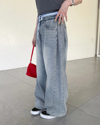 Side-out seam pleated denim pants