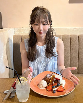 Shirred sleeveless blouse