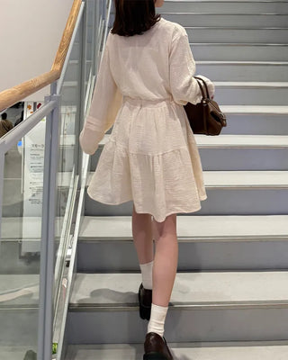 Shirred dress with strings