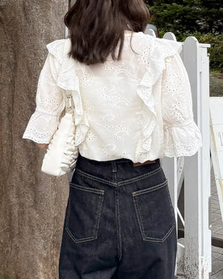 Punched ruffle blouse