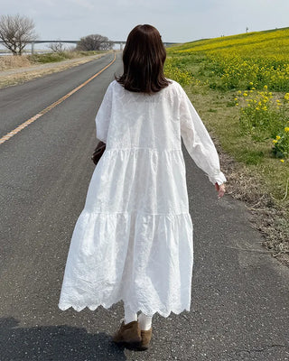 Long dress with neck lace detail and ruffles