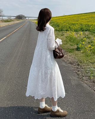 Long dress with neck lace detail and ruffles