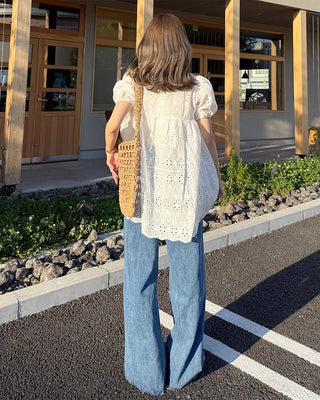 High-waisted denim pants with button strings