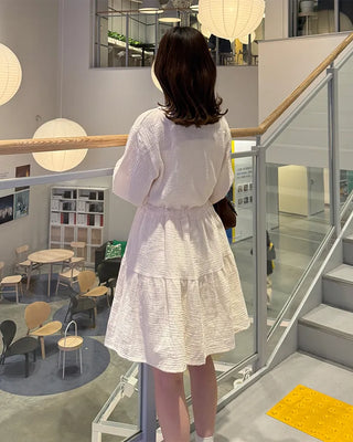 Shirred dress with strings