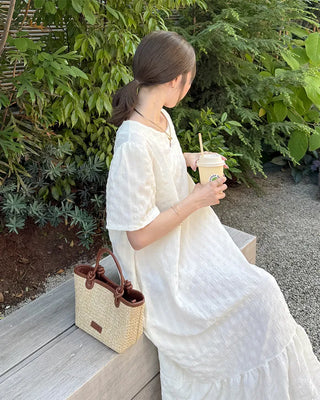 Long dress with ruffled hem