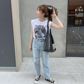 Distressed denim pants