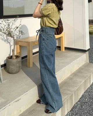 Strap high-waisted denim pants