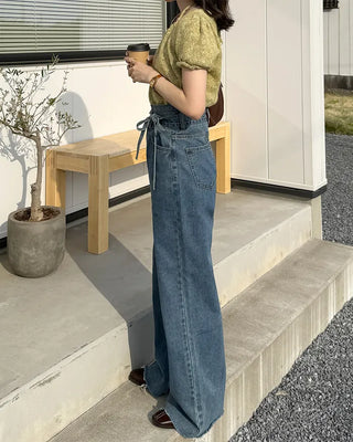 Strap high-waisted denim pants