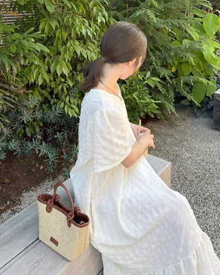 Long dress with ruffled hem