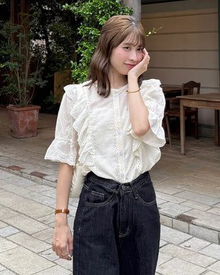Punched ruffle blouse