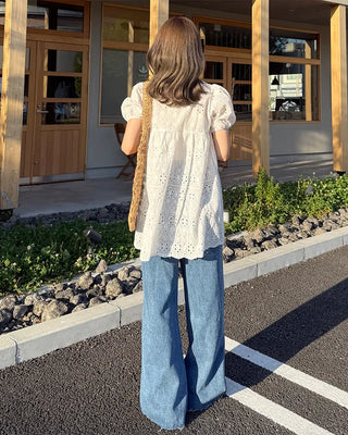 High-waisted denim pants with button strings