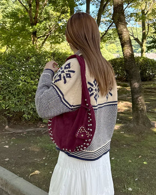 Studded suede shoulder bag