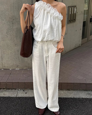 Asymmetrical ruffled sleeveless blouse