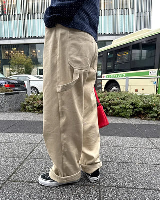 Cotton pants with side buckle patches