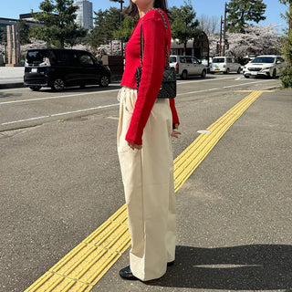 Round punching cardigan