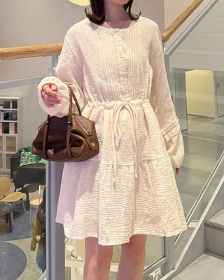 Shirred dress with strings