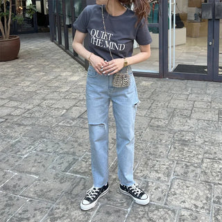 Distressed denim pants
