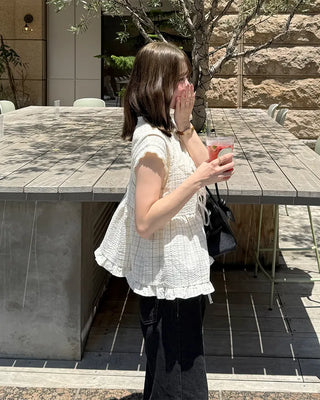 Two-way check sleeveless blouse