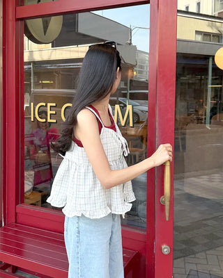 Checked ribbon sleeveless blouse