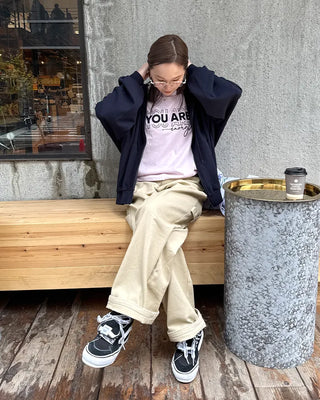 Cotton pants with side buckle patches
