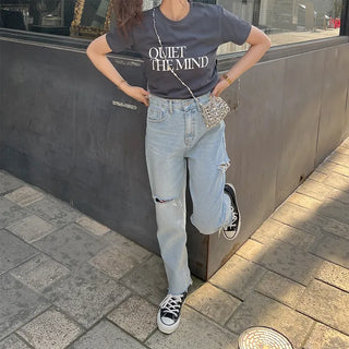 Distressed denim pants
