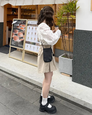 Short pleated pants