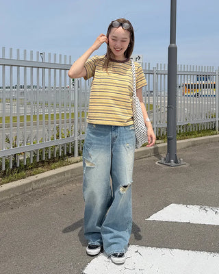 Distressed wide-fit denim pants