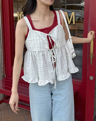 Checked ribbon sleeveless blouse