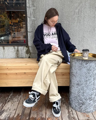 Cotton pants with side buckle patches