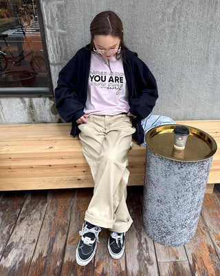 Cotton pants with side buckle patches