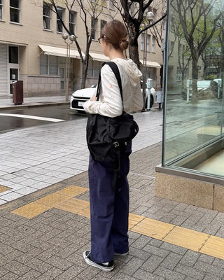 Square pocket nylon backpack