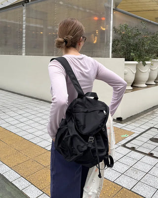 Square pocket nylon backpack