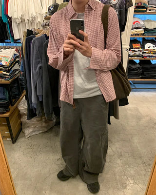 Pigmented side pockets, stitched details, wide cotton pants