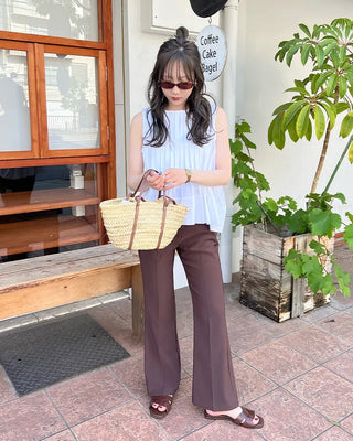 Pleated sleeveless blouse