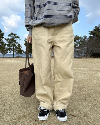 Cotton pants with side buckle patches