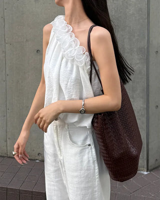 Asymmetrical ruffled sleeveless blouse