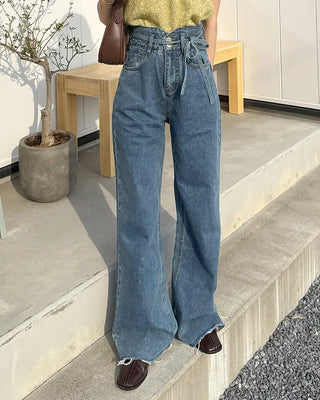 Strap high-waisted denim pants