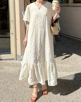 Long dress with ruffled hem