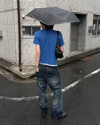 Oil-washed flared denim pants
