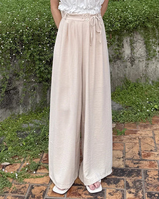 Two-button strap slacks