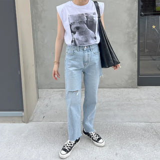 Distressed denim pants