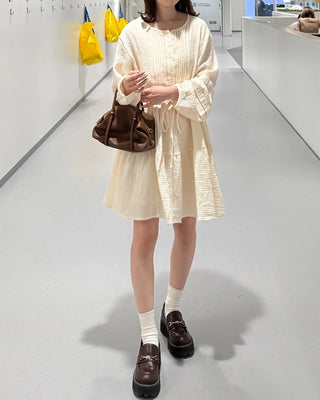 Shirred dress with strings
