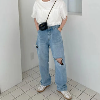 Distressed straight denim pants