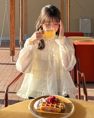 Tiered ruffle blouse