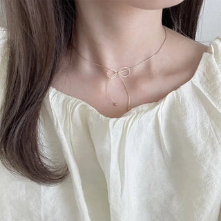 Ribbon motif necklace