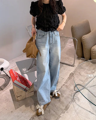 Side-point tapered denim pants